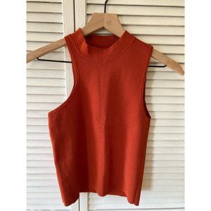 Orange tanktop with asymmetrical cutout